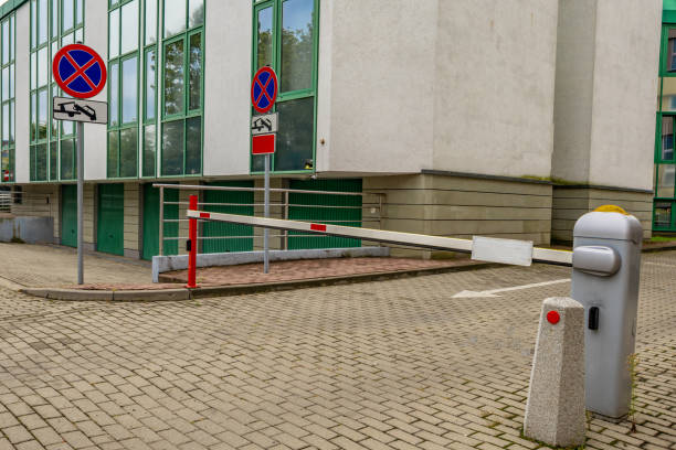 Abandoned parking barrier, empty spaces in the paid parking lot, entry to the property prohibited